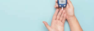 Person taking A1c Blood Glucose test